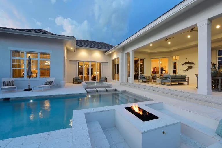 The Leeward – pool and fire pit at dusk