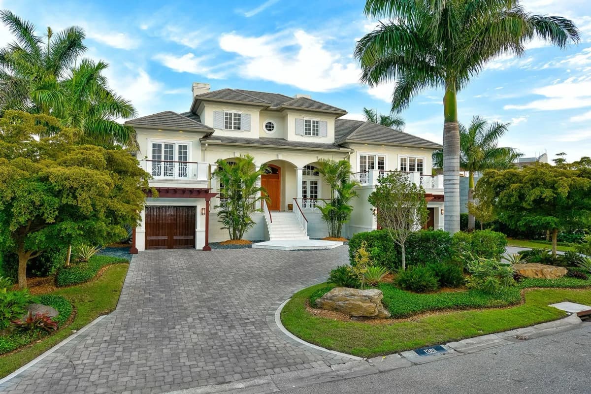 The Seaside coastal custom home with circular paver drive