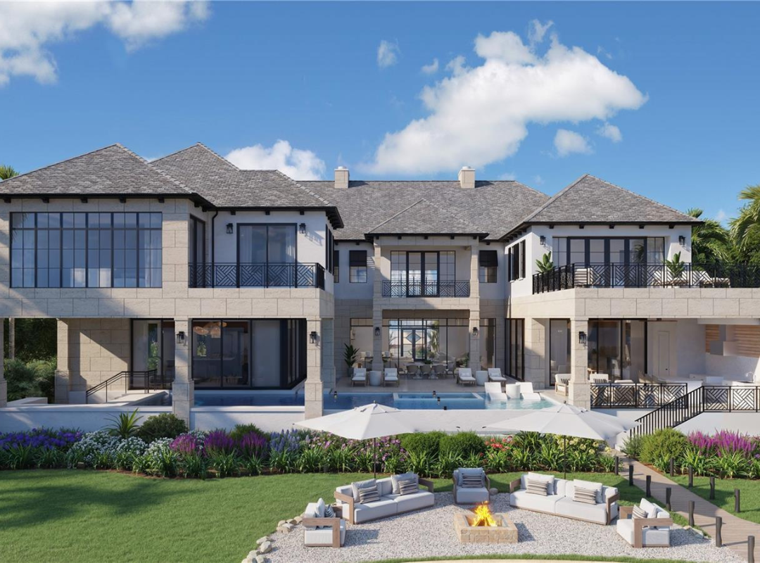 Modern two story luxury custom home exterior with two car garage and tropical landscaping in Sarasota FL built by Nutter Custom Construction